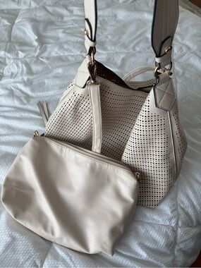 Two piece handbag set in cream colour.